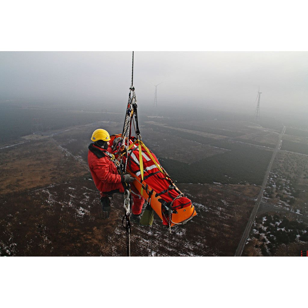 The original and still the best rescue stretcher for confined space, high angle or technical rescue, and traditional land based applications. The Sked stretcher is a revolutionary design which provides outstanding patient protection and security.
The Sked comes equipped for horizontal hoisting by helicopter or vertical hoisting in caves or industrial confined spaces. When the patient is packaged the stretcher becomes rigid. The durable plastic provides protection for the patient while allowing extrication