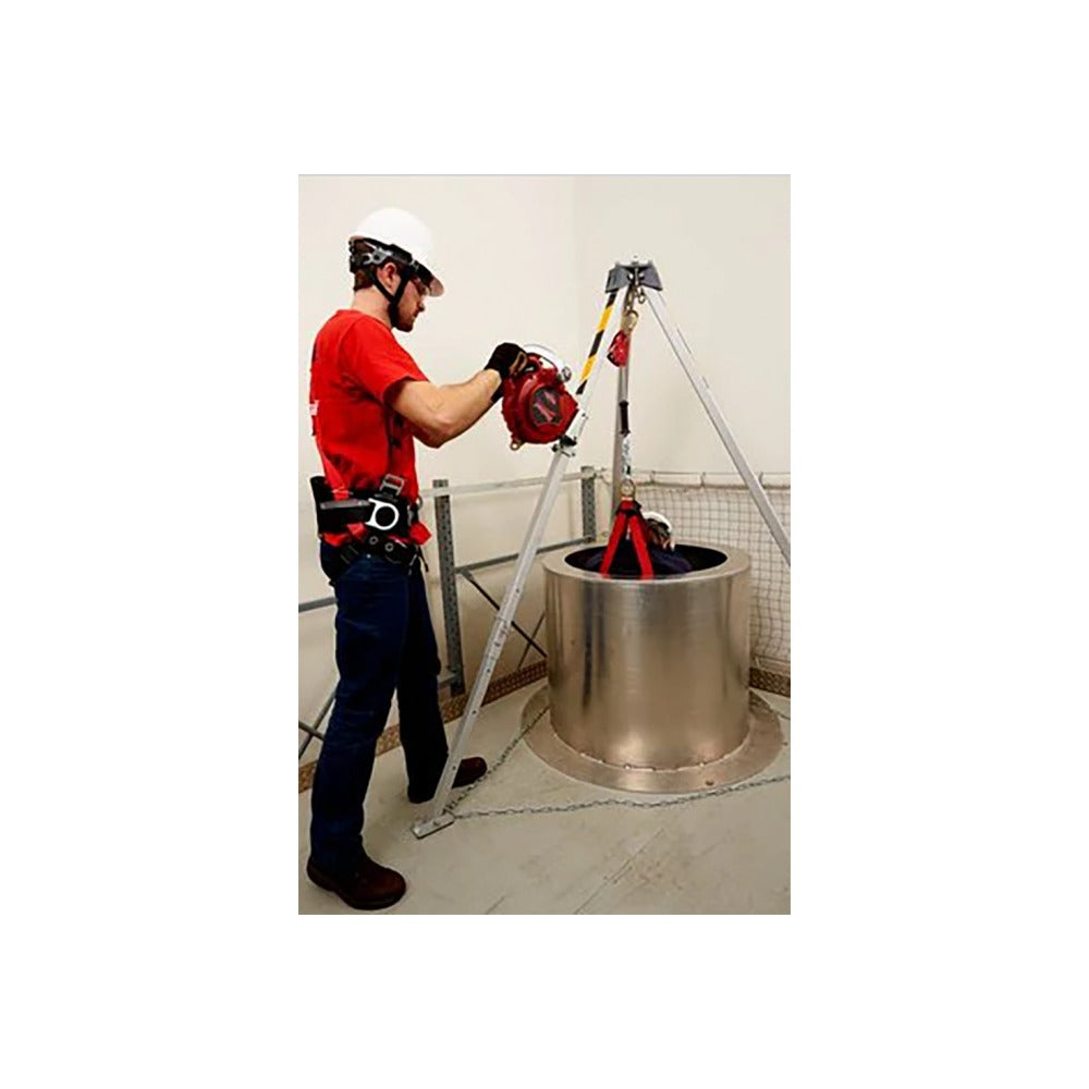 Worker operating the red three-way retracting lifeline on a Protecta aluminum tripod at a confined-space opening